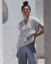 Cardigan smanicato effetto bouclé