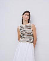 Top in maglia verde senza maniche