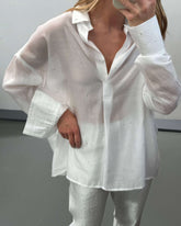 CAMICIA SEMITRASPARENTE CON STRASS