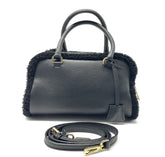 Borsa Chic in vera pelle con dettagli in pelliccia di montone