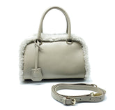 Borsa Chic in vera pelle con dettagli in pelliccia di montone