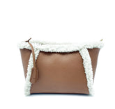 Borsa Chic in vera pelle con dettagli in pelliccia di montone