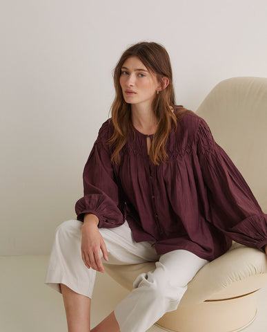 Blusa plissettata in cotone color melanzana