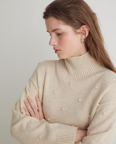 Maglione lavorato a maglia in misto lana ecrù