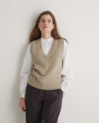 Gilet beige in lana merino con scollo a V