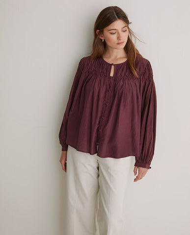 Blusa plissettata in cotone color melanzana