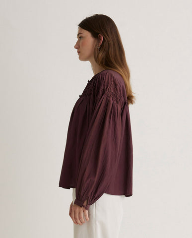 Blusa plissettata in cotone color melanzana