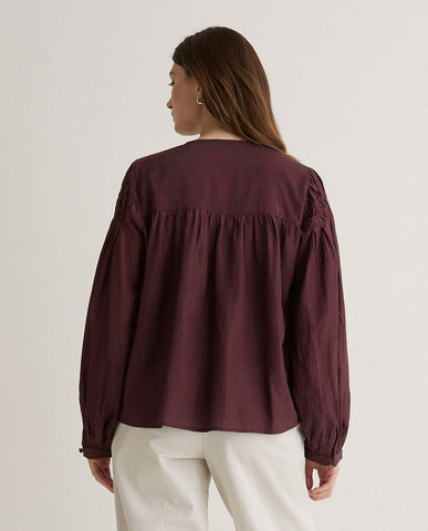 Blusa plissettata in cotone color melanzana