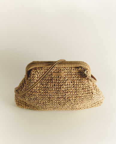 Pochette intrecciata con manico in pelle