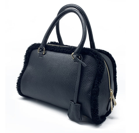 Borsa Chic in vera pelle con dettagli in pelliccia di montone