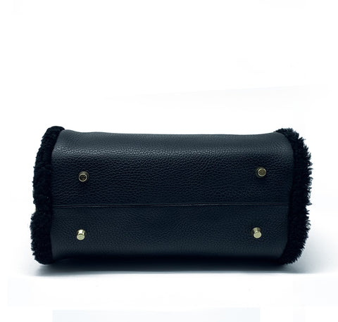Borsa Chic in vera pelle con dettagli in pelliccia di montone